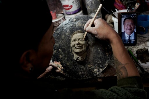 A Bolivian Artist Carves Faces of the Departed onto Day of the Dead Bread