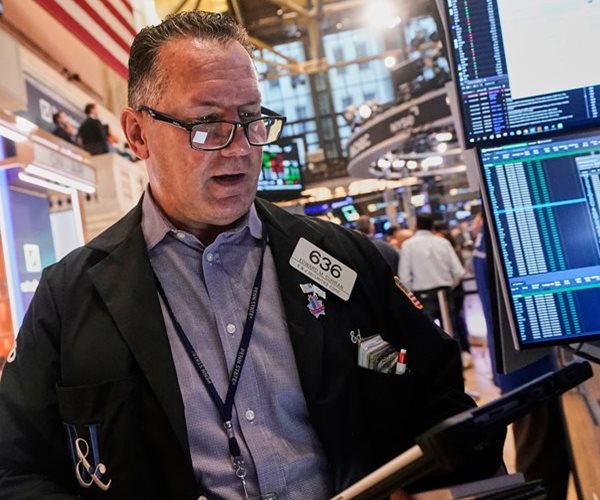Wall Street Ends Up as Investors Weigh Inflation Data