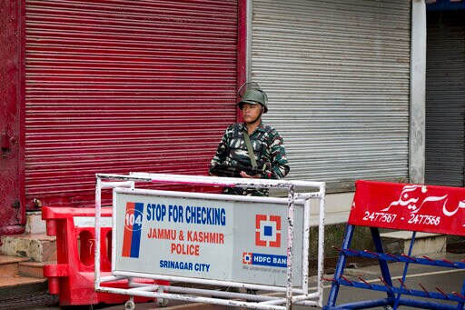 The Latest: Curfew to be Eased for Prayers in Kashmir