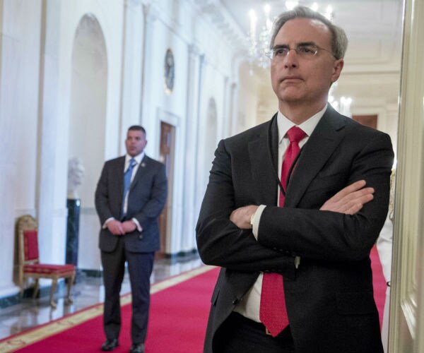 pat cipollone standing in the white house at an officer medal of valor presentation ceremony 