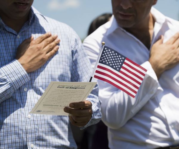 Colorado Teacher Accused of Assaulting Student Not Standing for Pledge of Allegiance
