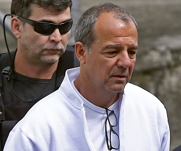 Former Rio de Janeiro Gov. Sergio Cabral is ushered to court