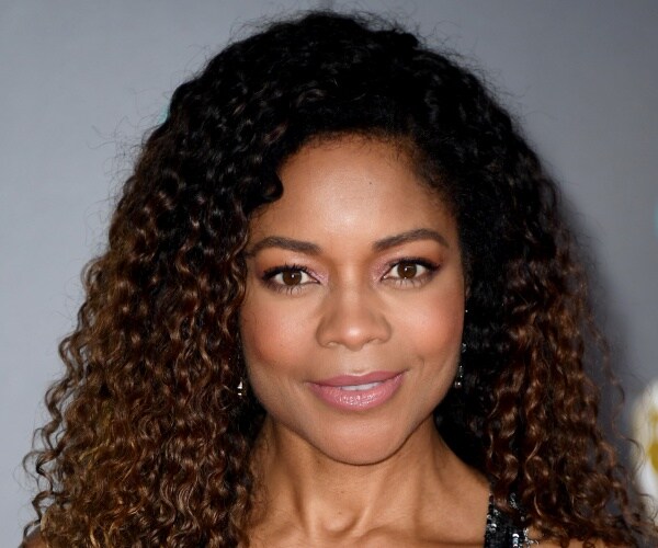 harris in a black sequined dress