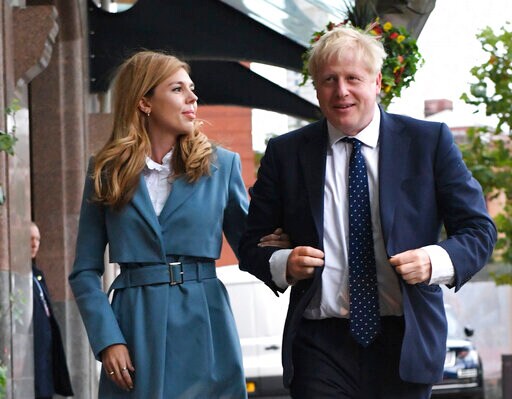 The Latest: UK PM Johnson Denies Favors for US Businesswoman