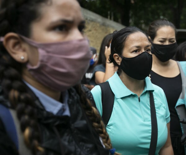 three women are shown wearing facial masks