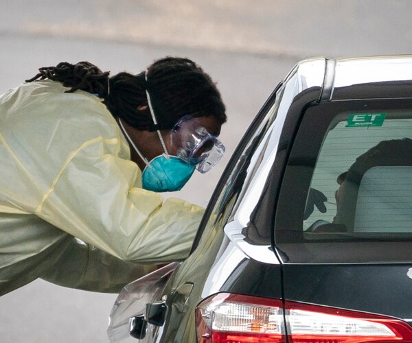 a drive-through coronavirus testing site in virginia