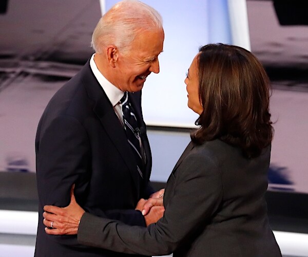 Joe Biden greets Sen. Kamala Harris, D-Calif., before Wednesday night's debate