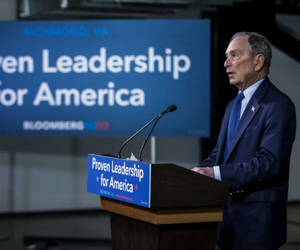 Michael Bloomberg speaks during a news conference with former Virginia Governor Terry McAuliffe.