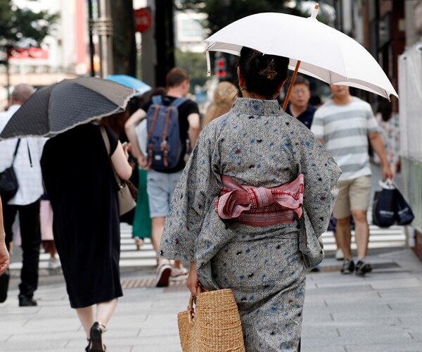 Japan Heatwave Kills at Least 14 Amid Flood Recovery