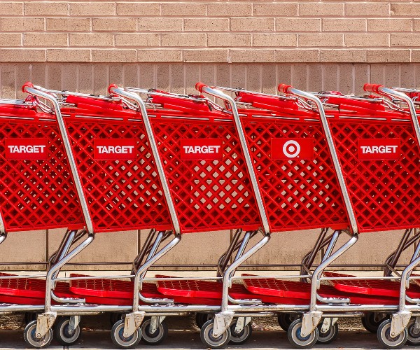 noted retailer logo and grocery carts 