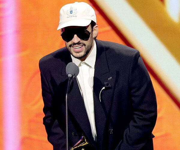 Puerto Rican rapper Bad Bunny plans to wear a dress during his Super Bowl halftime show as a nod to ...