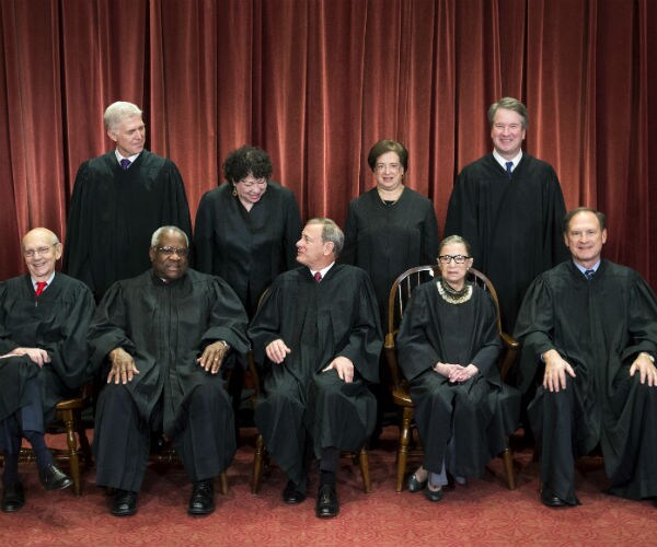 supreme court justices are shown in their black robes