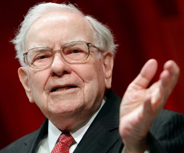 warren buffet sits onstage