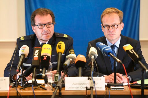 German Prosecutors: Suspect Used Poison Threats as Blackmail