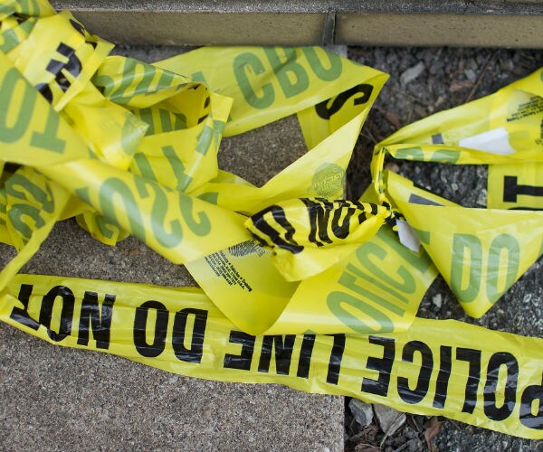 police tape lying on the ground