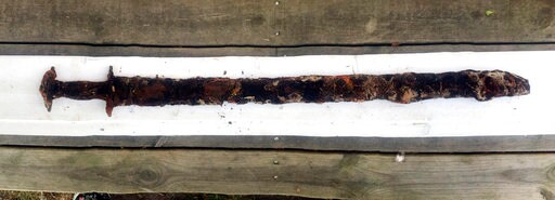 Swedish Girl Saga Pulls out Pre-Viking Era Sword from Lake
