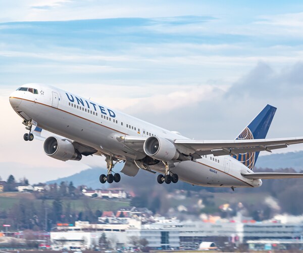 a united airlines plane takes off