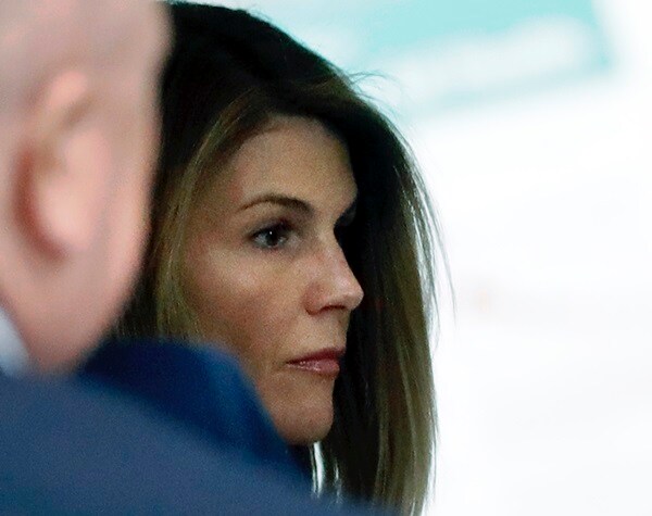 Actress Lori Loughlin Reports to Prison in College Scam