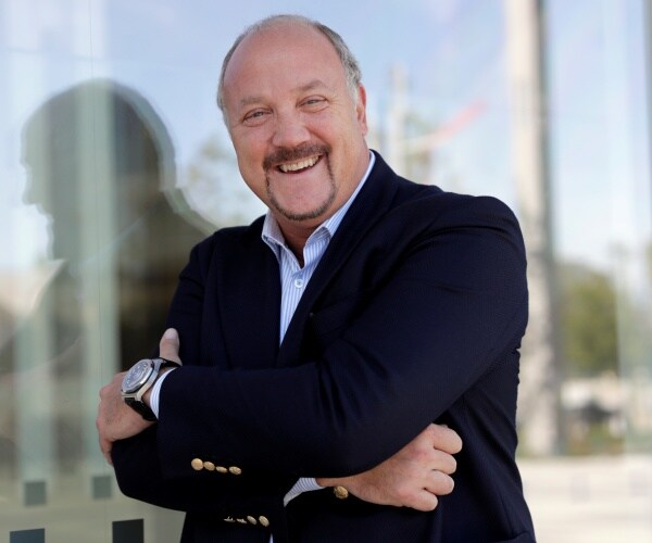 bradley birkenfeld smiles on courthouse steps