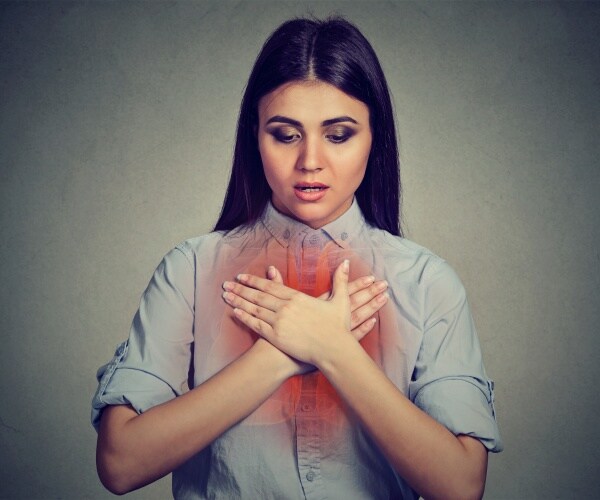 woman having asthma attack
