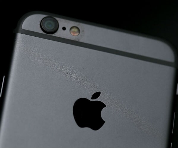 Apple IPhone Chip Supplier Says Virus Will Delay Shipments