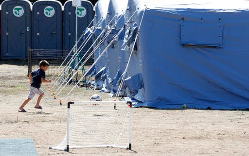 The Latest: Italy Relents, Will Hold Funeral in Quake Town