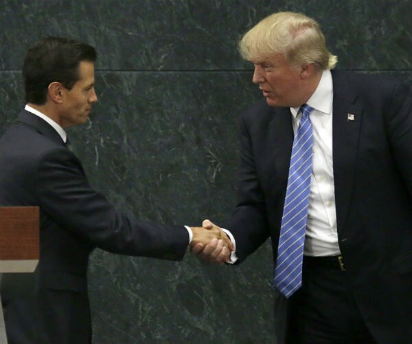 Mexico's Pena Nieto, Trump Speak by Phone, to Meet Jan. 31