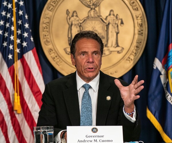 andrew cuomo speaks during a press conference