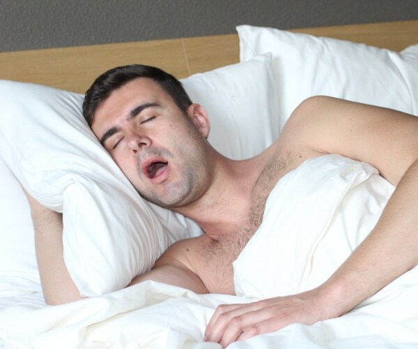 man sleeping with mouth open/sleep apnea