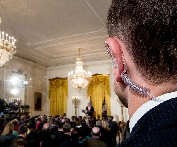 the earpiece in in an agent's ear