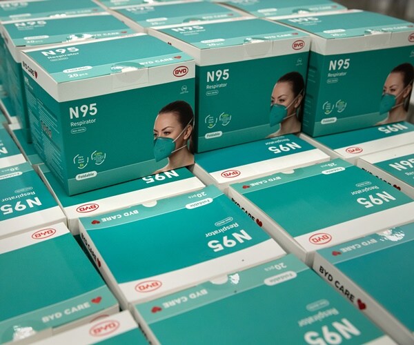 boxes of N95 masks are stacked up