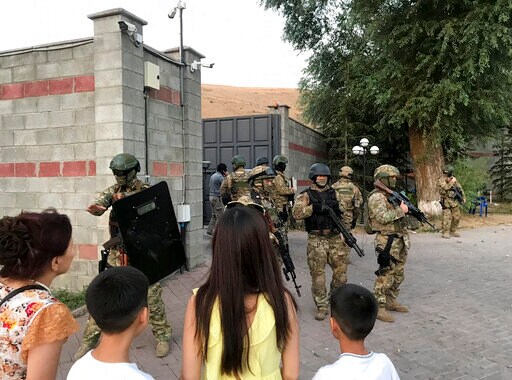 The Latest: 1 Dead in Raid to Arrest Former Kyrgyz President