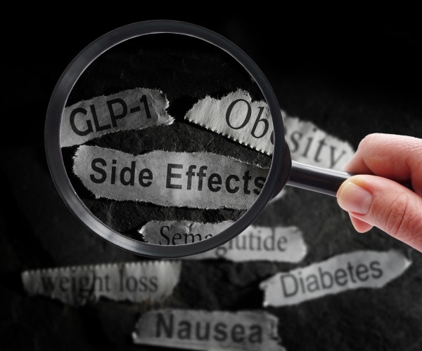 magnifying glass on 'side effects' in word wall of GLP-1 drugs