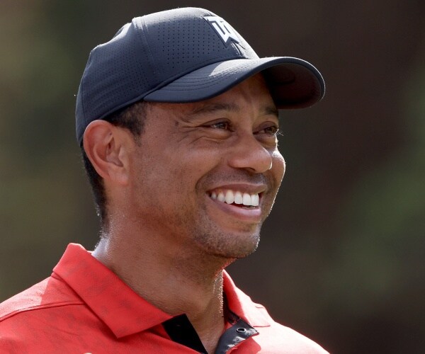 Tiger Woods smiles 