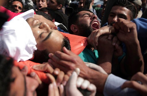 The Latest: Israel: Slain Gaza Reporter Was Hamas Militant