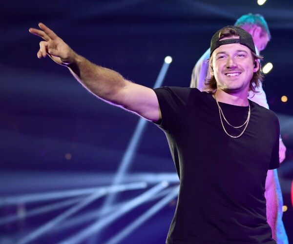 morgan wallen performs on stage