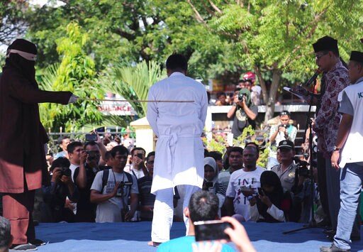 Indonesia's Aceh Carries out Public Canings Despite Pledge