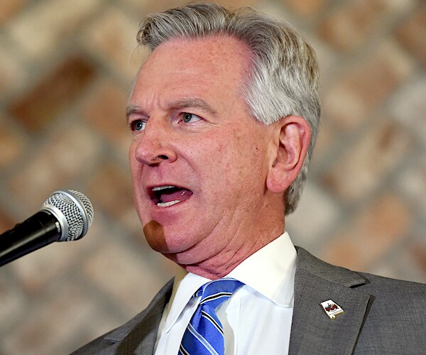 tommy tuberville speaks during a news conference