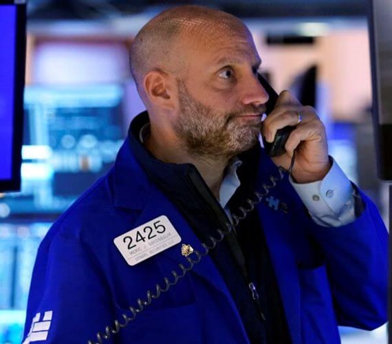 Wall St Slides as Rate Hike Forecasts Firm, Banks Surge