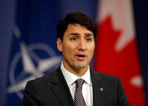 The Latest: Canadian Leader Stresses Intelligence-sharing