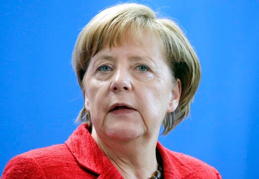 The Latest: France's New President to Meet Merkel Next Week