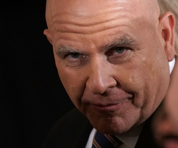 h r mcmaster leans forward and looks through his eyebrows in a photo