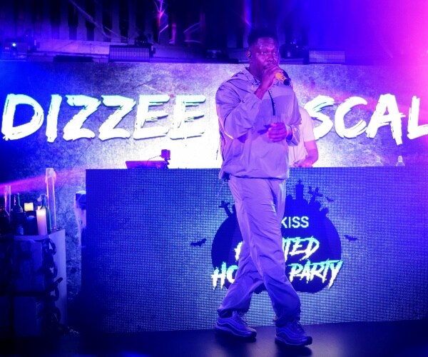 Rapper Dizzie Rascal performs on stage.