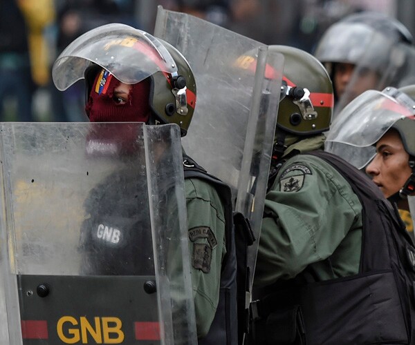 Venezuelan Soldier Arrested in Shooting of Pregnant Woman