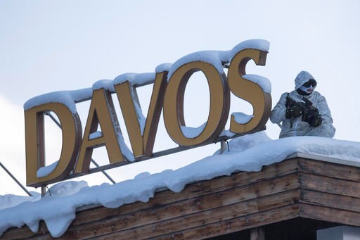 The Latest: Davos Organizers Urge Shift in Economic Policy