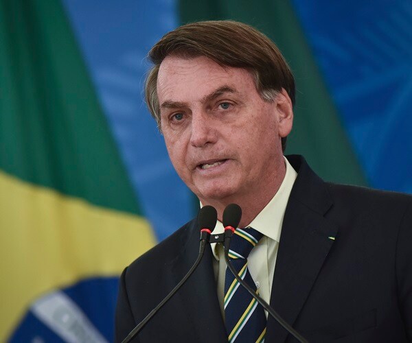 Brazil's Bolsonaro Questions Virus Deaths: 'Sorry, Some Will Die'