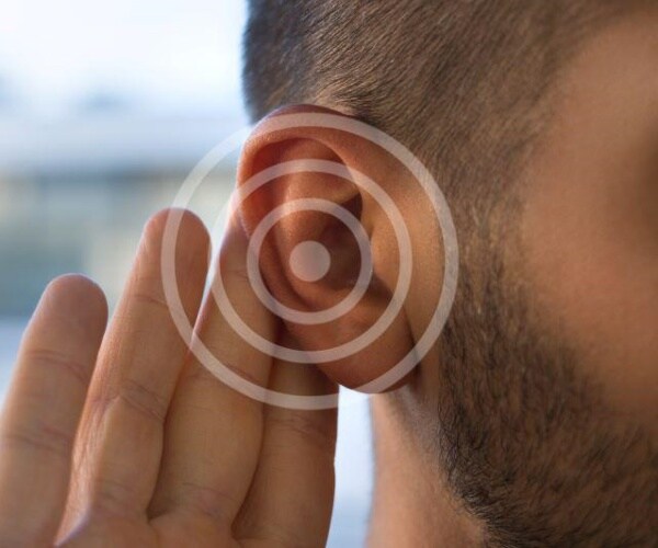 man with hand up to ear listening, with bullseye illustration next to ear. 