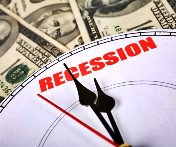 Dollar and clock face, concept of Economic Recession 
