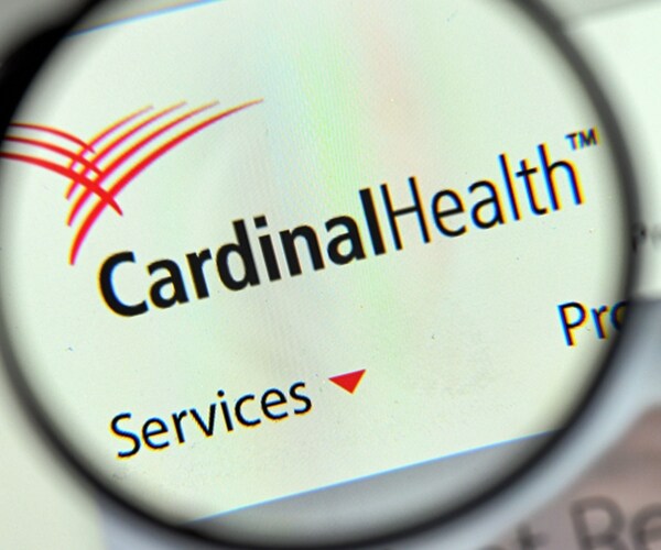 cardinal health logo on the website homepage through magnifying glass

