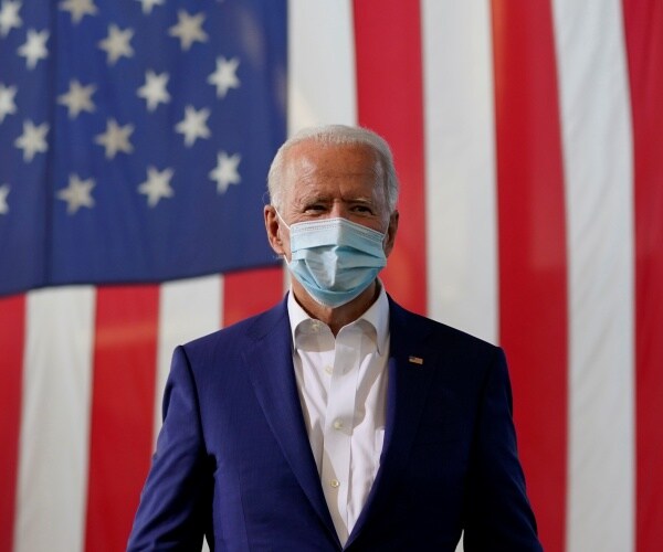 joe biden walks onto stage